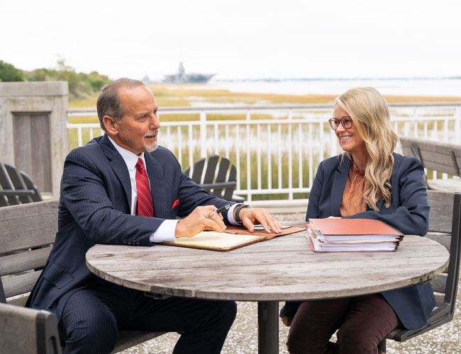 Peter David Brown and Sarah Kate Crane Tesner reviewing a criminal defense case